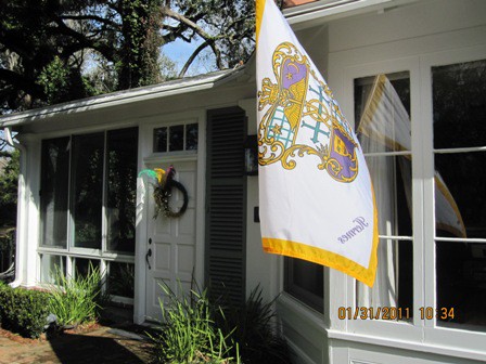 Carnival Krewe flag at home of a past king