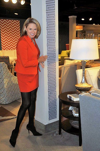 Libby uses her designer's eye to add her Mini Maze design for for Casart Coverings to a column at High Point Market