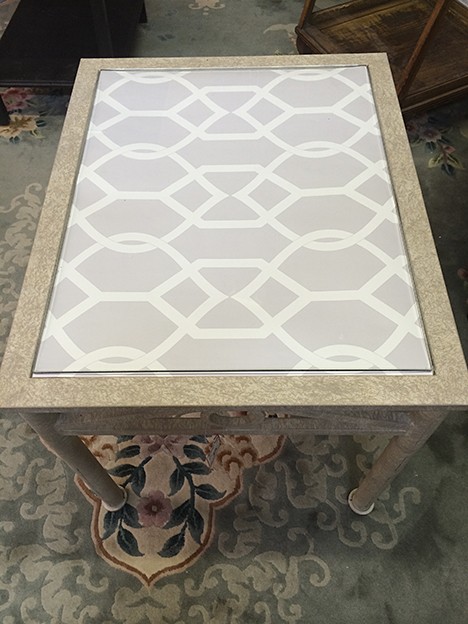 A glass tabletop is easily transformed with Libby Langdon Groovy Gate_Casart reusable wallpaper