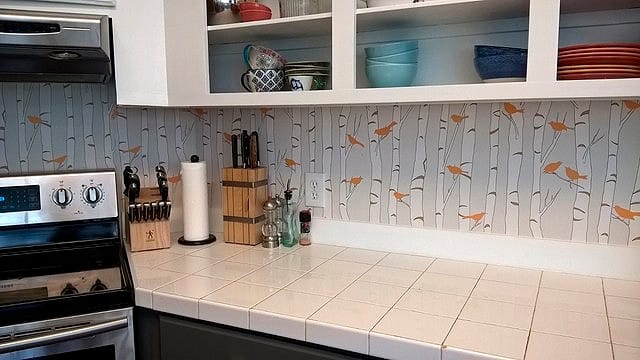 After: Kitchen with some painted cabinetry and Casart wallcovering 2